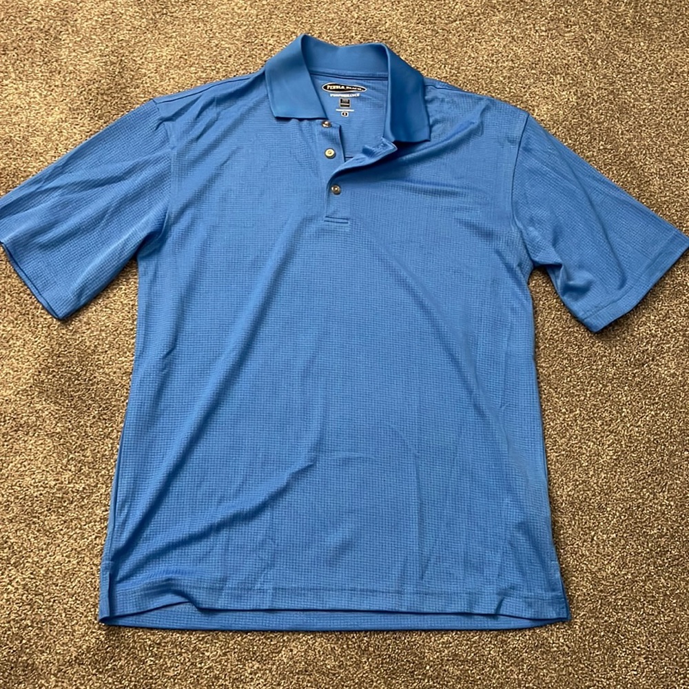 Pebble Beach blue polo shirt mens size: small loose